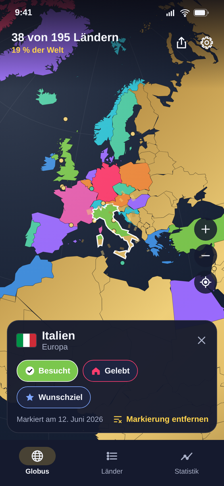 Italien wird auf dem Globus freigerubbelt, darunter die Karte mit dem Status Besucht